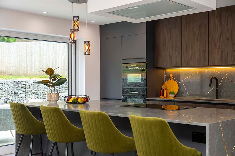 kitchen with green chairs