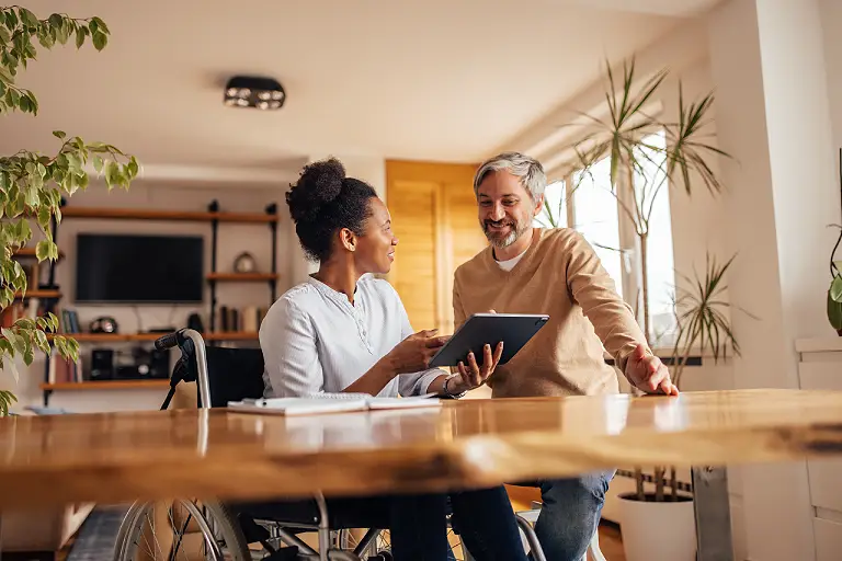 Couple looking on a tablet